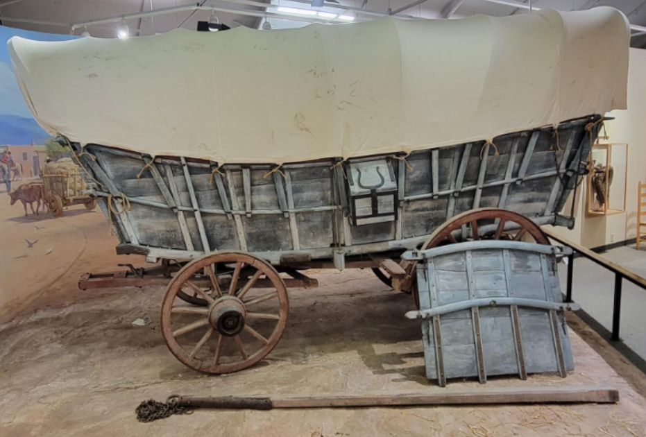 Authentic blue Conestoga covered wagon